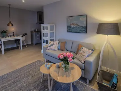 Ein Sitzbereich in der Unterkunft Strandpalais Apartment Kombüse