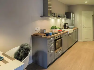 Küche/Küchenzeile in der Unterkunft Strandpalais Apartment Kombüse
