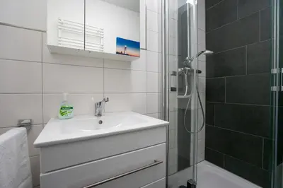 Ein Badezimmer in der Unterkunft Residenz Rosengarten Wohnung Meerjungfrau 1