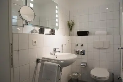 Ein Badezimmer in der Unterkunft Nordseebrandung FeWo B3 4