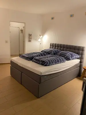 Ein Bett oder Betten in einem Zimmer der Unterkunft Seehütte Ferienwohnung 701