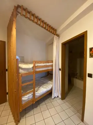 Ein Bett oder Betten in einem Zimmer der Unterkunft Meeresbrandung, Ferienwohnung 29