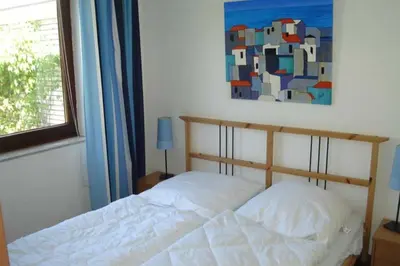 Ein Bett oder Betten in einem Zimmer der Unterkunft Am grooten Steen 22