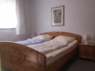 Ein Bett oder Betten in einem Zimmer der Unterkunft Nautilus, Ferienwohnung 15