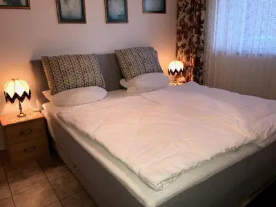 Ein Bett oder Betten in einem Zimmer der Unterkunft Nautilus, Ferienwohnung 22