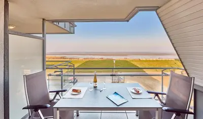 Ein Balkon oder eine Terrasse in der Unterkunft Düne 1, Ferienwohnung 12