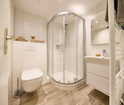 Ein Badezimmer in der Unterkunft Dünenglück, Ferienwohnung 32