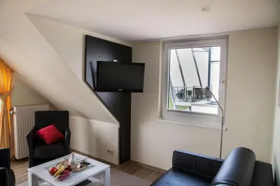 TV/Unterhaltungsangebot in der Unterkunft Dünenglück, Ferienwohnung 32
