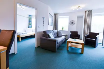 Ein Sitzbereich in der Unterkunft Haus Nordseebrandung NB43