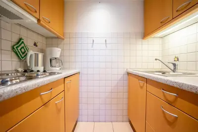Küche/Küchenzeile in der Unterkunft Hus Willem Wohnung I 14