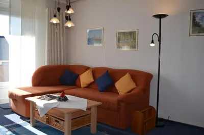 Ein Sitzbereich in der Unterkunft Hus Willem Wohnung I 19