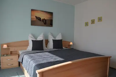 Ein Bett oder Betten in einem Zimmer der Unterkunft Hus Willem Wohnung I 19