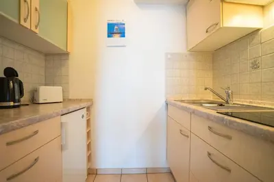 Küche/Küchenzeile in der Unterkunft Hus Willem Wohnung I 20