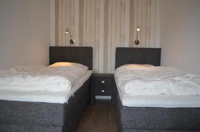 Ein Bett oder Betten in einem Zimmer der Unterkunft Hus Willem Wohnung II 10