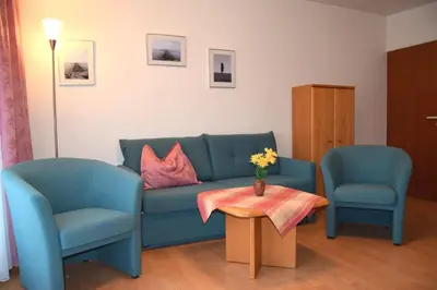 Ein Sitzbereich in der Unterkunft Hus Willem Wohnung II 23