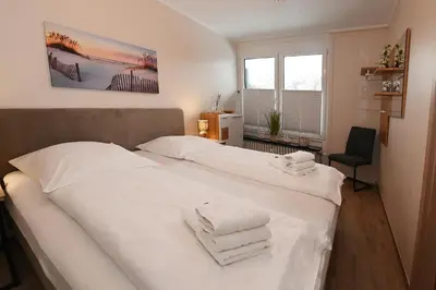 Ein Bett oder Betten in einem Zimmer der Unterkunft Viktoriastraße 5 Elsi 807, ehem Spahn