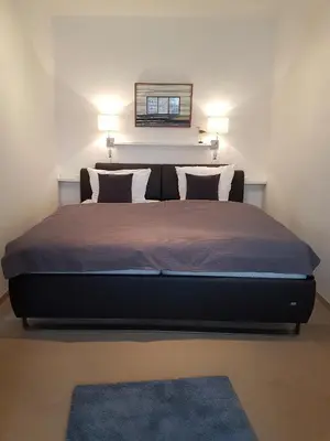 Ein Bett oder Betten in einem Zimmer der Unterkunft Viktoriastraße 5 Nill 808