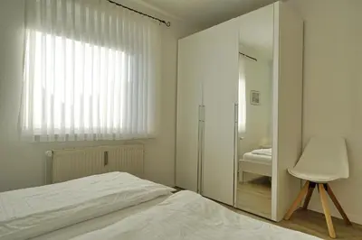 Ein Bett oder Betten in einem Zimmer der Unterkunft Seemeile 3 2