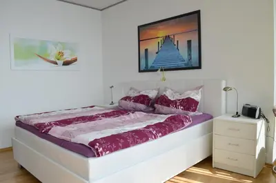Ein Bett oder Betten in einem Zimmer der Unterkunft Büsumer Hochhaus Wohnung Jacqueline