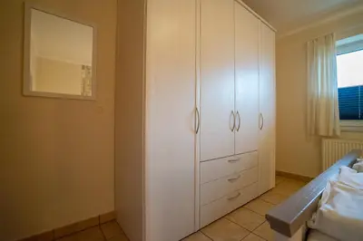Ein Bett oder Betten in einem Zimmer der Unterkunft Seewärts Wohnen
