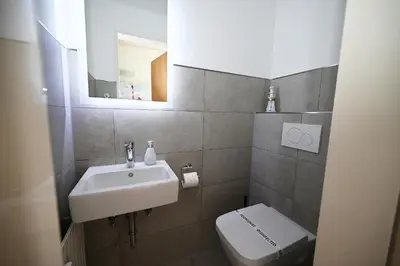 Ein Badezimmer in der Unterkunft Wohnung Pauline mit Strandkorb am Deich