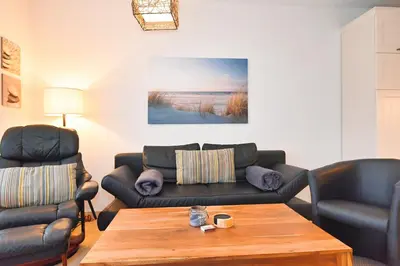 Ein Sitzbereich in der Unterkunft Seehafen 0 3