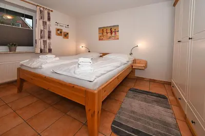Ein Bett oder Betten in einem Zimmer der Unterkunft Heike