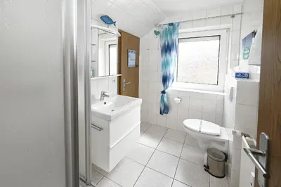 Ein Badezimmer in der Unterkunft Büsumer Kurparkblick