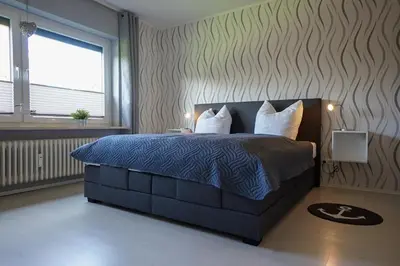Ein Bett oder Betten in einem Zimmer der Unterkunft Viktoriastraße 5 Anja 809