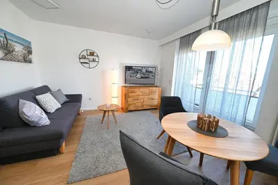 Ein Sitzbereich in der Unterkunft Hus Willem Wohnung I 16, Strandläufer