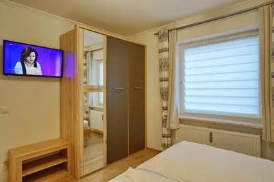 Ein Bett oder Betten in einem Zimmer der Unterkunft Seemeile 2 18 Seestern