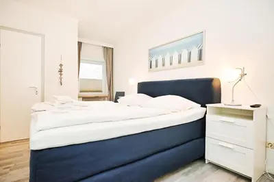 Ein Bett oder Betten in einem Zimmer der Unterkunft Kuschelkajüt