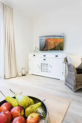 TV/Unterhaltungsangebot in der Unterkunft Strandvilla Apartment Hafenglück