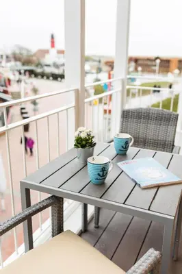 Ein Balkon oder eine Terrasse in der Unterkunft Strandvilla Apartment Hafenglück