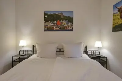 Ein Bett oder Betten in einem Zimmer der Unterkunft Tobermory