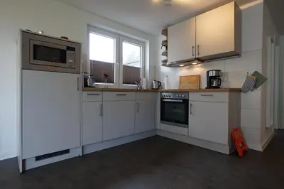 Küche/Küchenzeile in der Unterkunft Haus zwischen den Deichen Wohnung 3