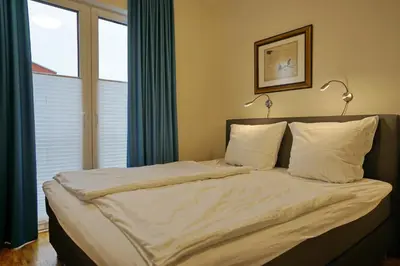 Ein Bett oder Betten in einem Zimmer der Unterkunft Helios