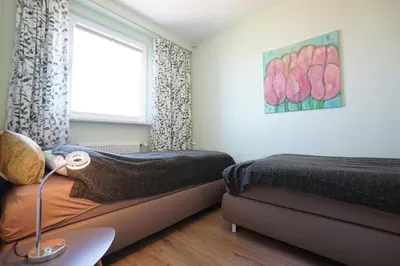 Ein Sitzbereich in der Unterkunft Büsumer Hochhaus Wohnung Gezeitenblick