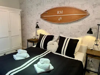 Ein Bett oder Betten in einem Zimmer der Unterkunft Apart Pier 2
