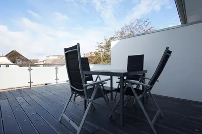 Ein Balkon oder eine Terrasse in der Unterkunft Penthouse am Deich