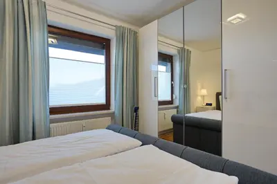 Ein Bett oder Betten in einem Zimmer der Unterkunft Schloss am Meer Wohnung 41 mit seitlichem Hafenblick