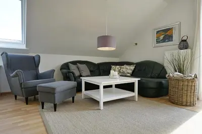 Ein Sitzbereich in der Unterkunft Möwennest