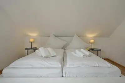 Ein Bett oder Betten in einem Zimmer der Unterkunft Möwennest