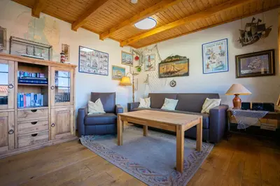 Ein Sitzbereich in der Unterkunft Klaar Kimming Haus Wattwurm
