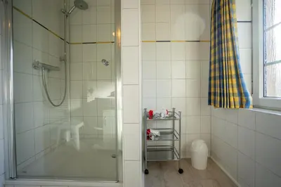 Ein Badezimmer in der Unterkunft Klaar Kimming Haus Wattwurm