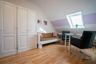 Ein Sitzbereich in der Unterkunft Residenz Rosengarten Wohnung 305 mit Meerblick