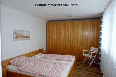Ein Bett oder Betten in einem Zimmer der Unterkunft Panorama Whg 89, 6 OG