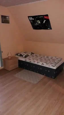 Ein Bett oder Betten in einem Zimmer der Unterkunft Ferienhof-Meyer