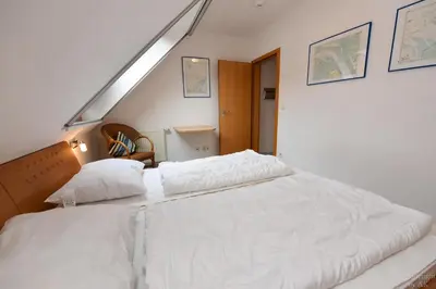 Ein Bett oder Betten in einem Zimmer der Unterkunft Ferienanlage 