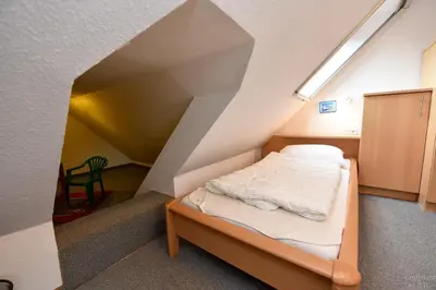 Ein Bett oder Betten in einem Zimmer der Unterkunft Ferienanlage 